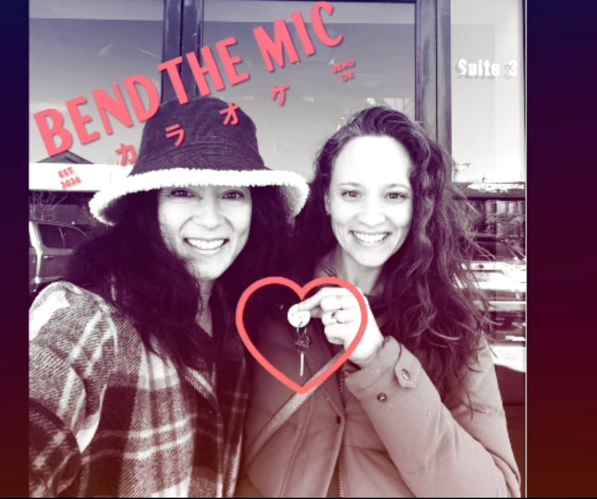 Gretchen and Lara with the keys to the new space